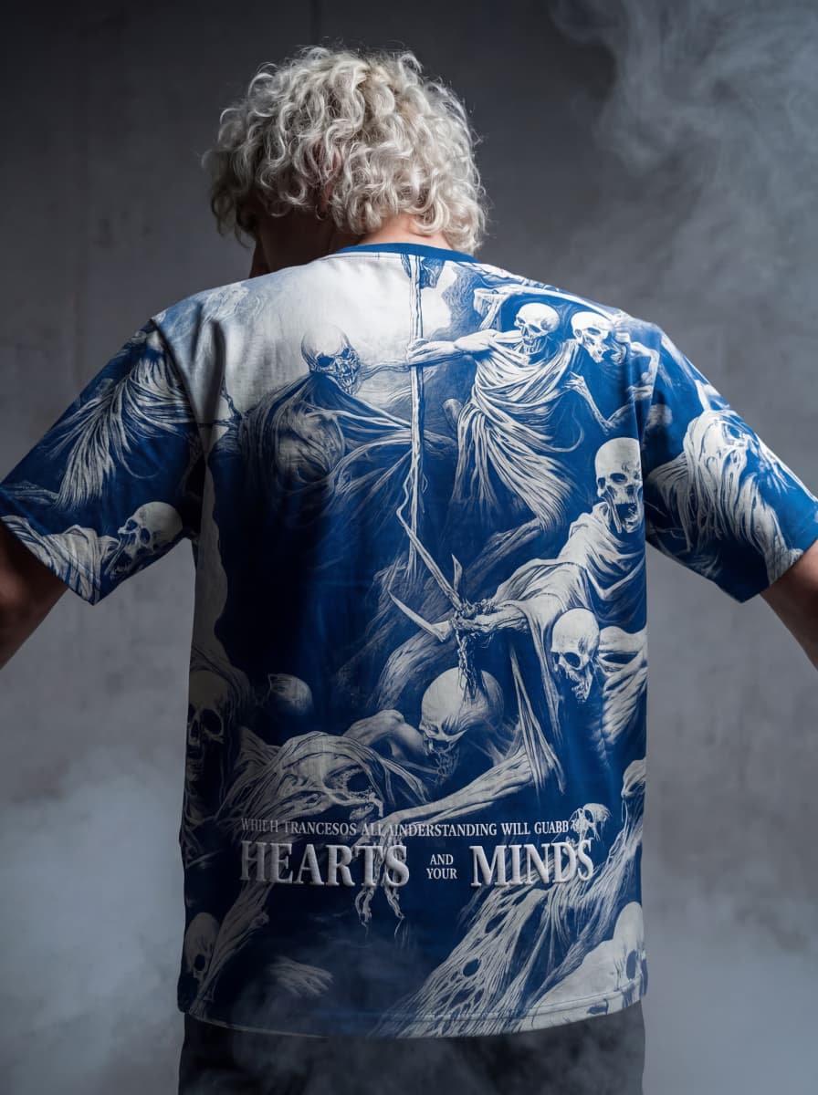 Back view of Blue and White oversized streetwear tee with detailed skeletal graphic and Hearts and Your Minds branding.
