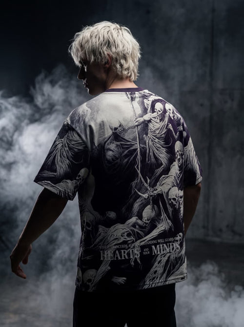 Back view of Purple and Black all-over print gothic t-shirt featuring reaper artwork and Hearts and Your Minds text.